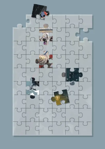 Graue Puzzleplatte mit einigen gelegten Teilen